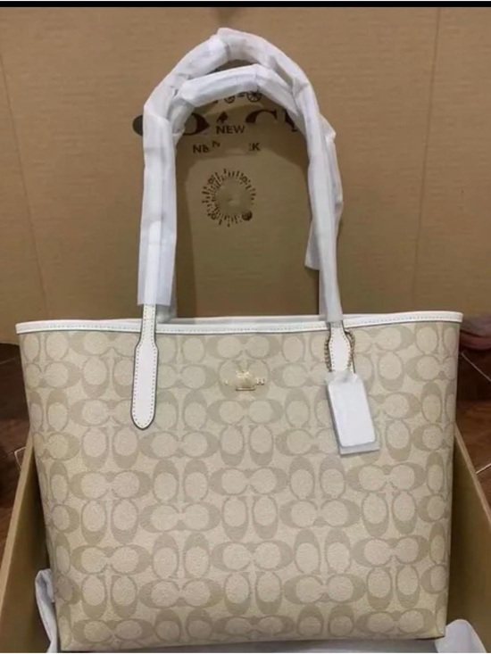 Coach Handbags - Coach Signature Canvas Tote in Beige and White
